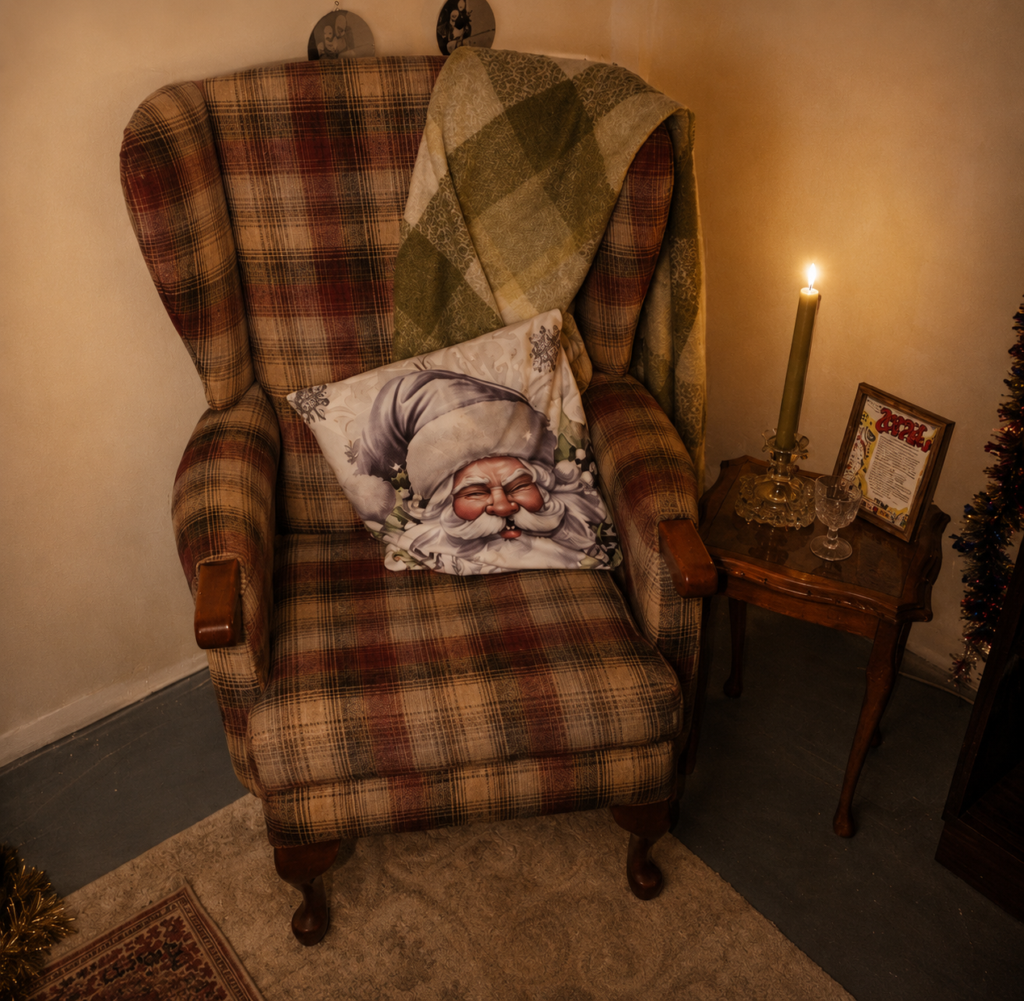 Installation detail showing a vintage armchair, side table, candle and domestic interior setting.