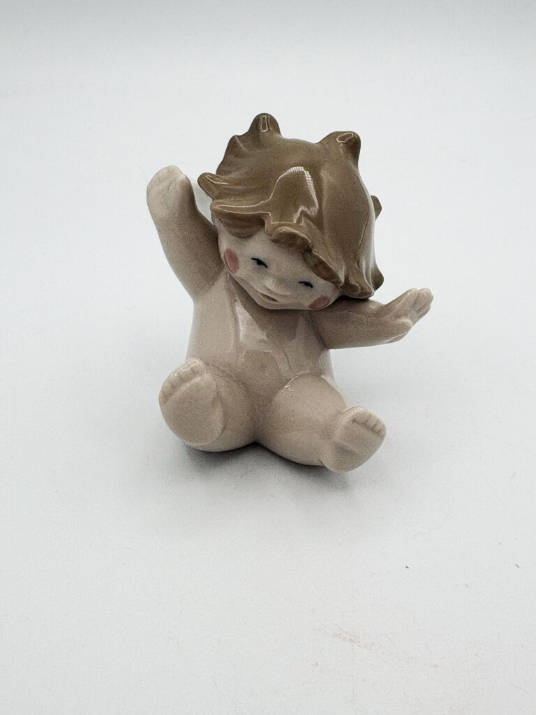 Giggles- a trinket my Gran used to collect.