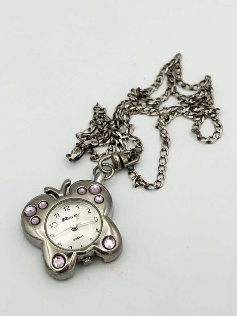 Butterfly Watch Necklace- My Gran was obsessed with watches, and this was a unique part of her collection.