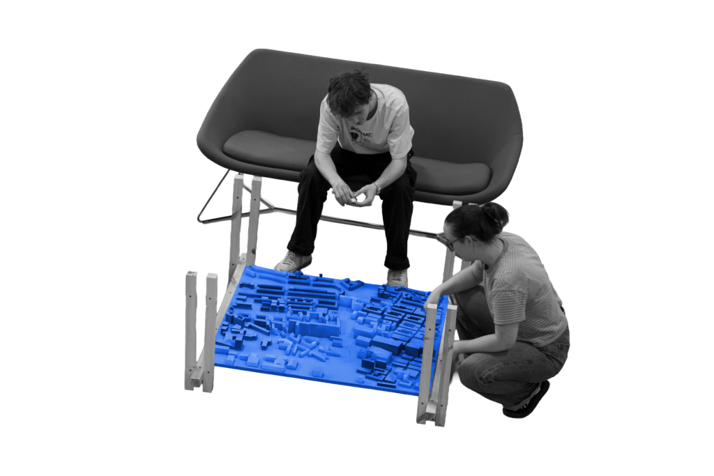 People engaging with one of the project outcomes, the Protopion* learning device.